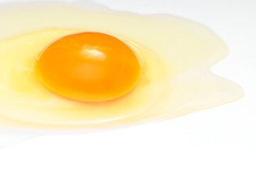 Broken egg on a white background