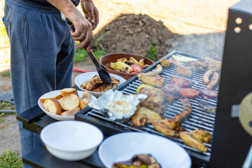 Grill sausages and vegetables. Selective focus.
