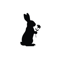 Black silhouette of a rabbit holding a flower silhouette