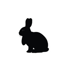 Black silhouette of a rabbit sitting still
