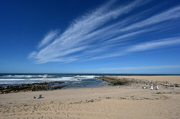 Praia de Canide, Canide Beach, on northern coast of Portugal in Vila Nova de Gaia under dramatic autumn cloudscape.