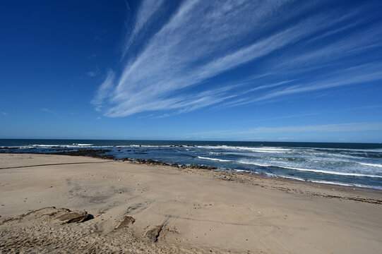 Praia de Canide, Canide Beach, on northern coast of Portugal in Vila Nova de Gaia under dramatic autumn cloudscape.