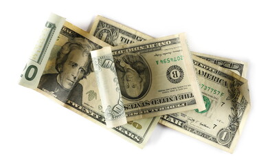 American dollar bills, paper money banknotes isolated on white background, top view