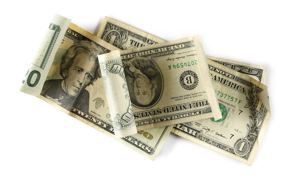 American dollar bills, paper money banknotes isolated on white background, top view