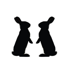 Two black rabbit silhouettes facing each other