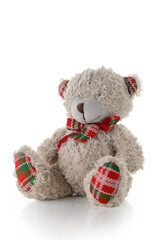 Cute plush teddy bear stuffed toy isolated on white