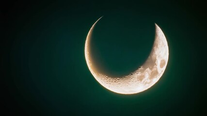 Crescent Moon in Sky: A close-up shot of a mesmerizing crescent moon in the night sky, its radiant glow contrasting against the dark backdrop. - Powered by Adobe