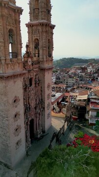 Drone lands in front of iconic Santa Prisca Church in Taxco, capturing its historic baroque beauty