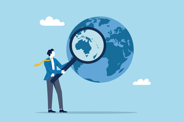 Global search for opportunity, businessman analyzing world map.