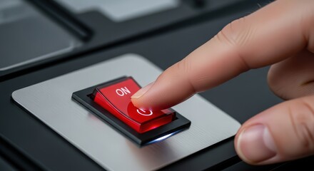 Finger Turning On Red Power Switch