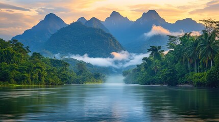 Tropical River Landscape with Mountains and Mist at Dawn
