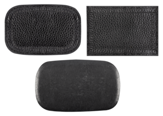 Isolated photo of black leather oval patches on white background.