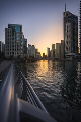 Dubai Marina, showcasing its impressive skyline with modern skyscrapers, luxury yachts, and the vibrant waterfront. Perfect for travel, architecture, and lifestyle projects.