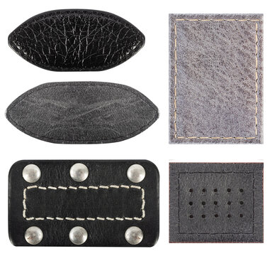 Isolated photo of various black leather patches with stitch borders, rivets or studs and perforation on white background.