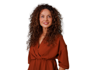 Smiling middle-aged woman with curly brown hair, wearing a rust-colored dress, posing with transparent background