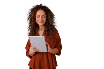 Obraz premium Woman smiling, confident and focused, holding a digital tablet for online browsing and communication, transparent background
