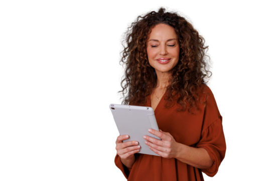 Woman using tablet, smiling and reading on digital device, enjoying connectivity and mobile technology