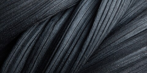 Dramatic black plant fiber pattern shows texture with rhythmic lines in dark monochrome natural theme