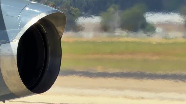 Detail of the jet blast from a stationary military aircraft showing the distorted light from the hot moving air.