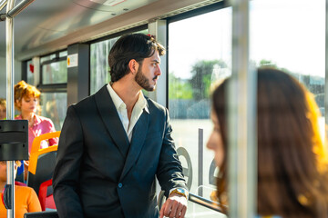 Man commuting by bus looking through window