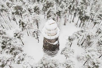 Old observatory tower in the Glen park. Tallinn, Estonia, against dramatic sky