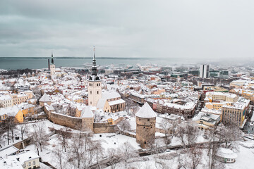 Aerial View of Tallinn in winter, roofs are covered with snow, Christmas mood