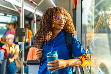 Nurse commuting to work on public bus