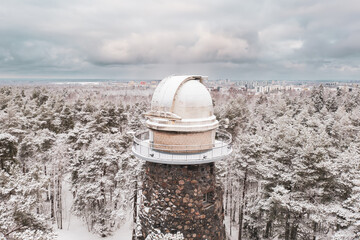 Old observatory tower in the Glen park. Tallinn, Estonia, against dramatic sky