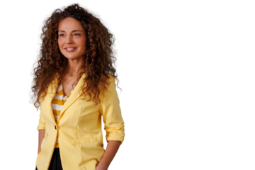 Confident businesswoman with curly hair smiling, wearing a yellow blazer, enjoying success and opportunity on transparent background