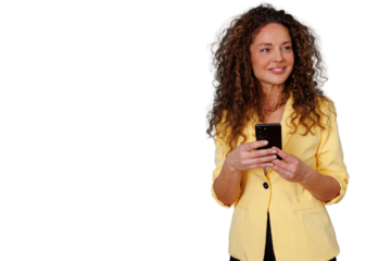 Woman holding phone, smiling, wearing yellow blazer, looking away. Communication and technology concept. Transparent background