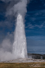 The crown jewel of Yellowstone, Old Faithful, erupt in a breathtaking spectacle of boiling water and billowing steam