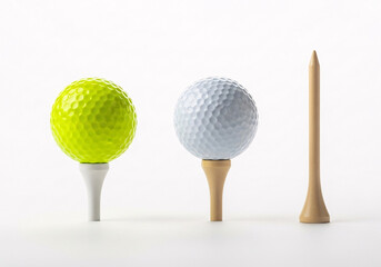 Two golf balls, one bright yellow and one white, sit on tees next to a wooden tee on a plain white background, studio lighting. isolated on white background