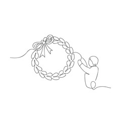 Single line drawing of a person hanging a wreath with a bow
