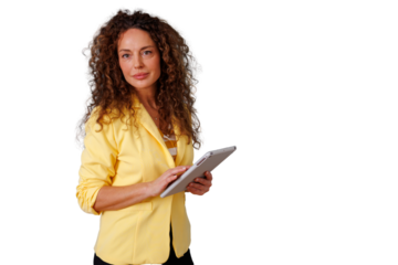 Confident businesswoman wearing a yellow blazer, holding and using a digital tablet. Transparent background