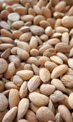 Obraz premium Close up photo of dried natural almonds, selective focus.