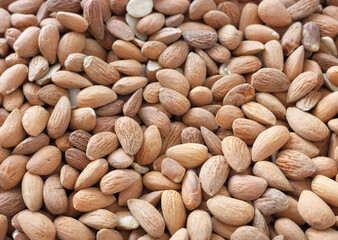 Close up photo of dried natural almonds, selective focus.