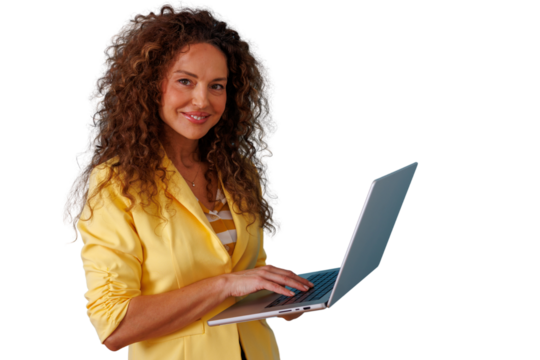 Businesswoman with curly hair smiling and looking at camera, using a laptop for work, managing online tasks. Transparent background