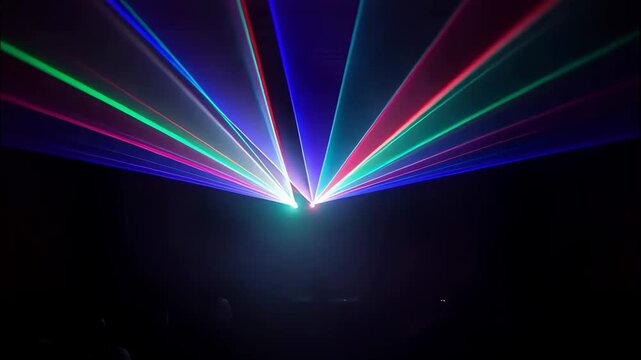 Vibrant colorful laser beams creating abstract light patterns in a dark environment, ideal for entertainment and technology themes - Powered by Adobe