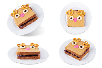Berry jam peanut butter sandwich in the form of deer for Christmas holidays on a white isolated background