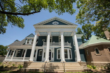 Afternoon sun shines on historic homes in downtown Emporia, Kansas, USA.