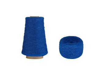 A Blue fluffy yarn set with a spool on a cardboard bobbin and a smaller ball, isolated on a white background. Perfect for knitting, crocheting, or craft projects this delicate yarn adds a gentle
