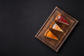 Cheesecake, a slice of sweet pie, a classic cheese dessert. Cheesecake as a food background