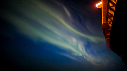 Display of the Aurora Borealis, Northern Lights, off the North East Coast of Iceland, sailing into the Arctic Circle. 
