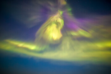 Display of the Aurora Borealis, Northern Lights, off the North East Coast of Iceland, sailing into the Arctic Circle. 