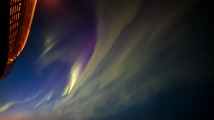 Display of the Aurora Borealis, Northern Lights, off the North East Coast of Iceland, sailing into the Arctic Circle. 