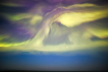 Display of the Aurora Borealis, Northern Lights, off the North East Coast of Iceland, sailing into the Arctic Circle. 