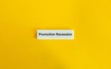 Promotion Recession Message on White Tile Over Yellow Background