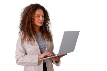 Businesswoman standing, looking right, smiling, holding laptop, typing, working on technology with transparent background