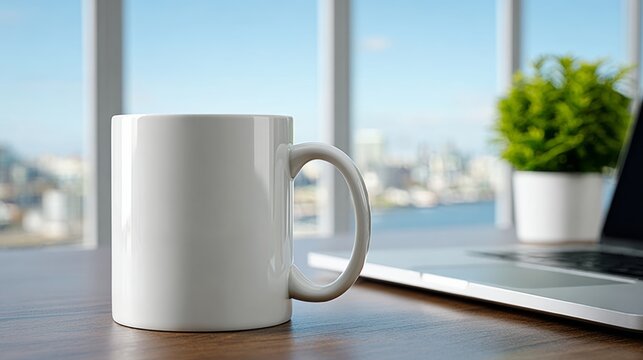 White coffee mug sits on a wooden table next to a laptop - Powered by Adobe