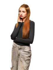 A young woman with long brown hair and a black shirt and jeans white background. Fashion and beauty. Stunning teenager model with slim athletic body type.